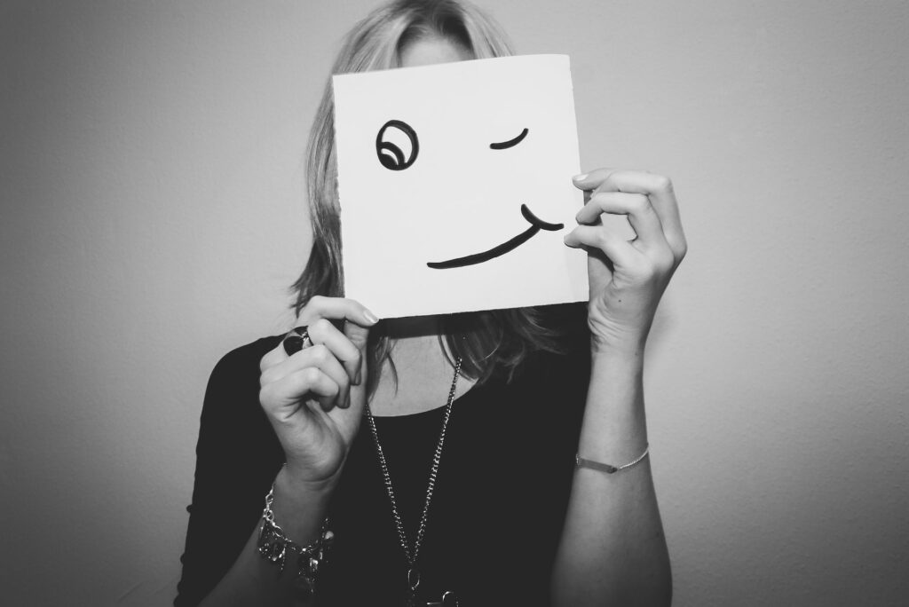 smile, face, emoji, impostor syndrome, the meaning of impostor syndrome 