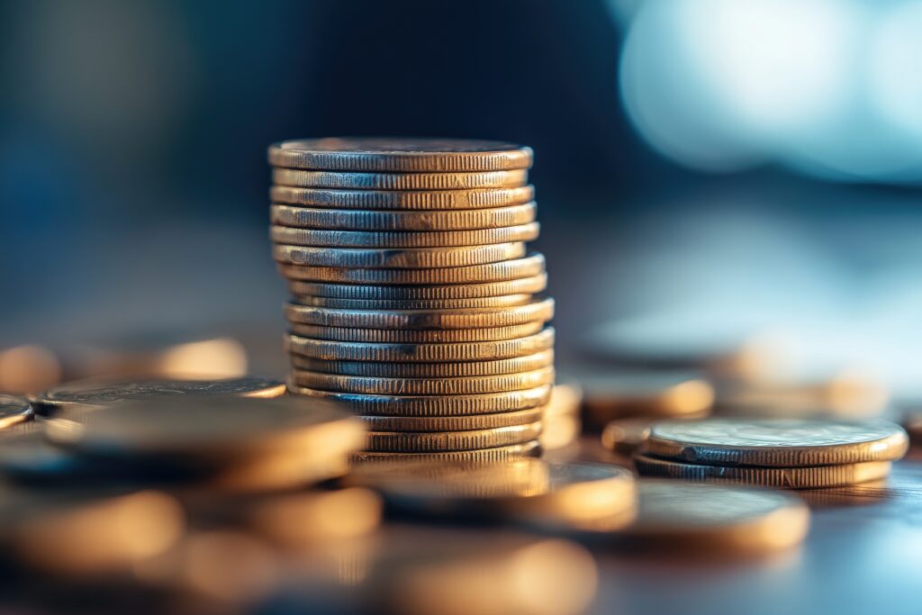 Stacked coins financial prosperity - Tradeinfo.cz mince, Investiční mince, investice