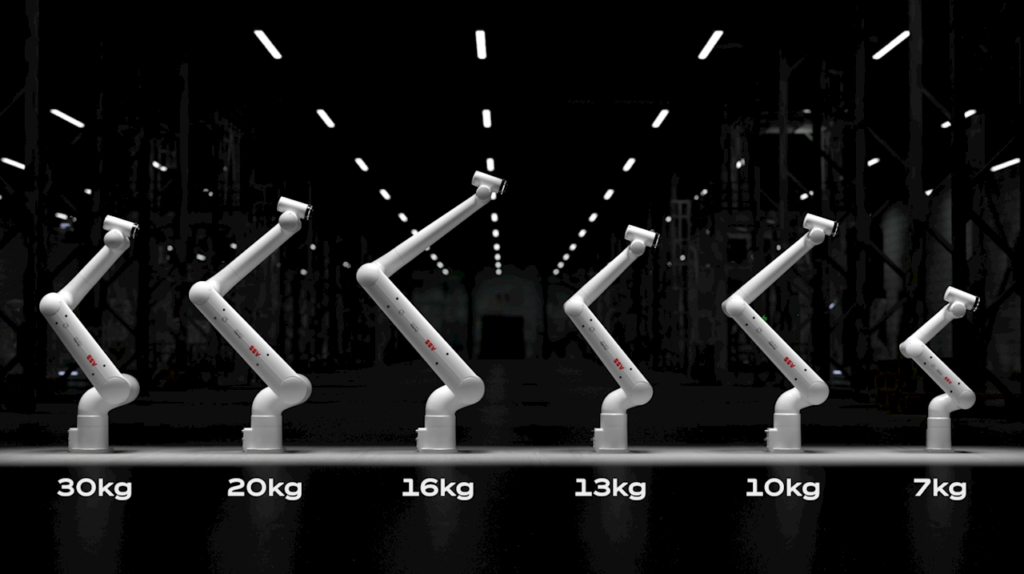 PoWa family ABB - Tradeinfo.cz Row of white robotic arms lifting weights in a line, from 30 kg down to 7 kg, in a dark factory setting.