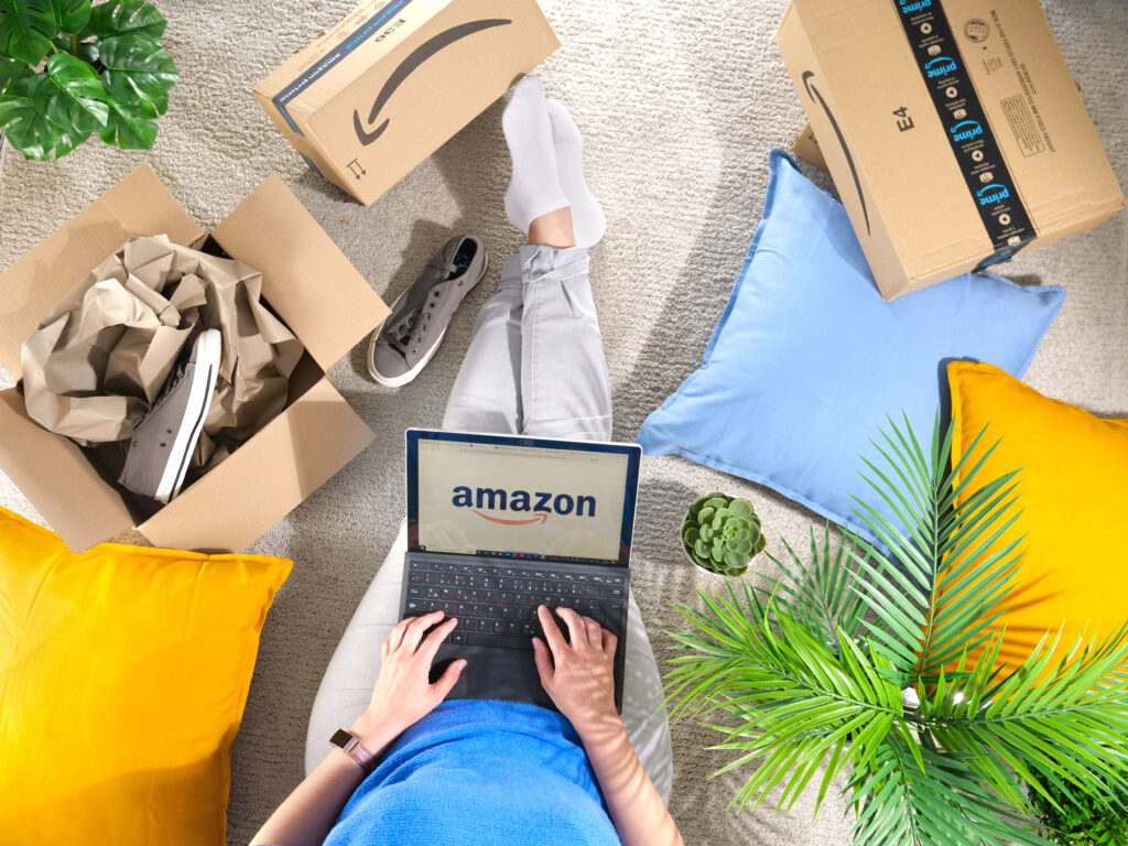 Germany Rostock - Juni 13 2022 Stack of Amazon Prime packages woman shopping online at Amazon Prime Day Distance home and online shopping - Tradeinfo.cz Amazon - AWS, AI