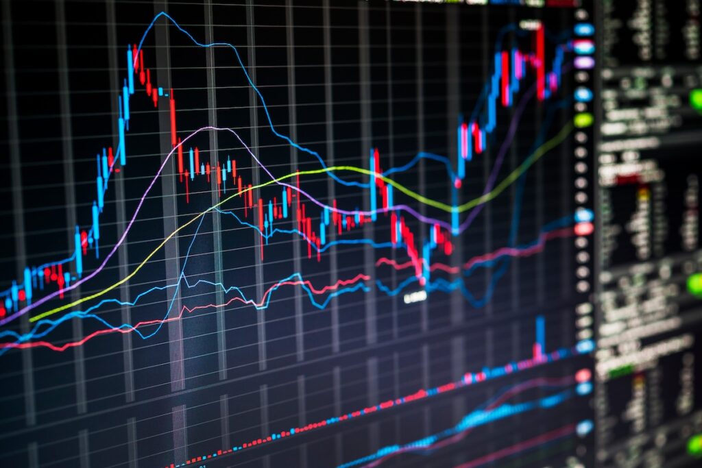 bonds53454653 - Tradeinfo.cz Multi-line stock chart on a dark grid showing price trends and indicators with a data panel on the right.